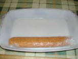Biokolbász - Az elkészült kolbászrudat tedd a tepsibe!